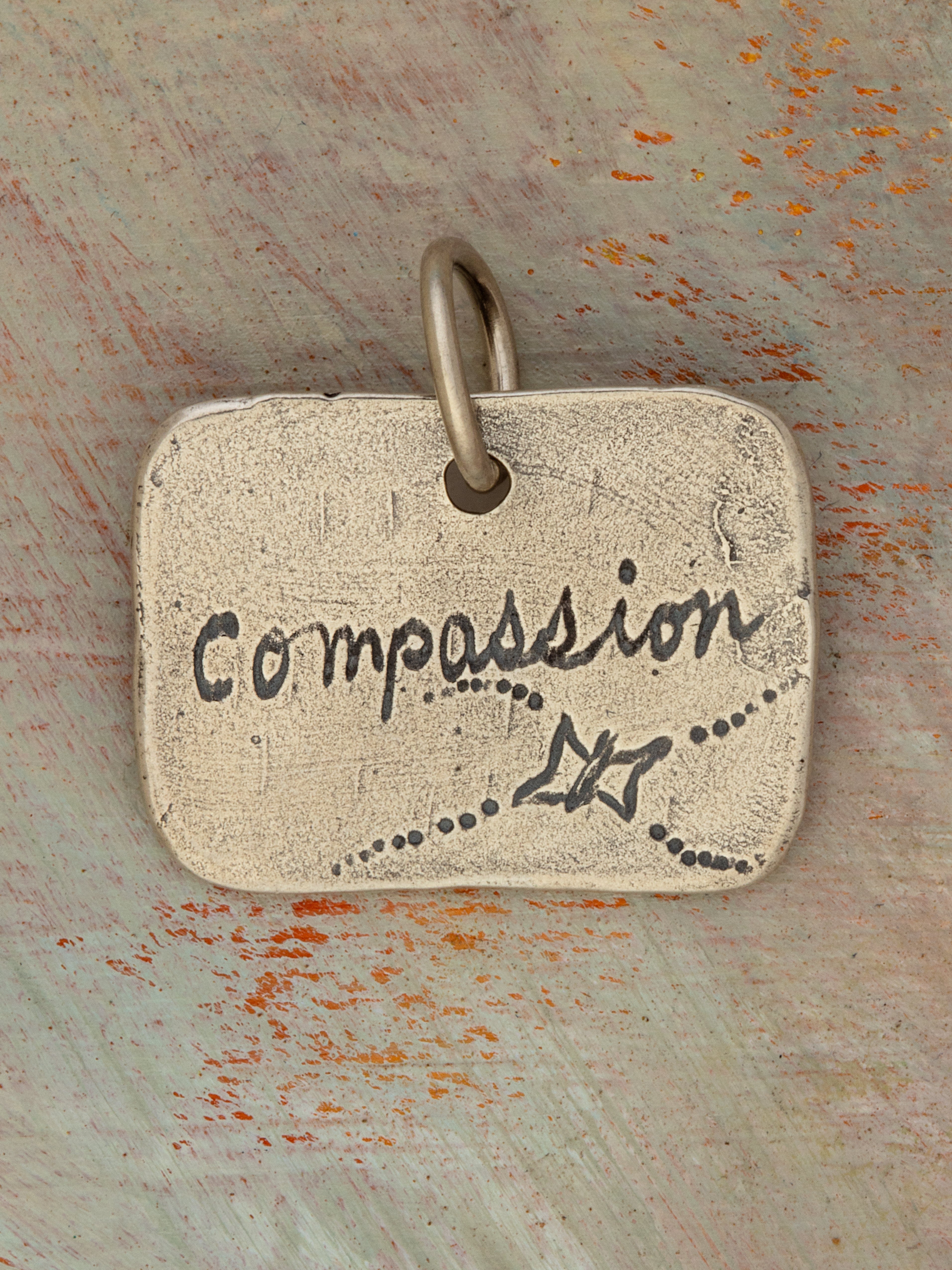 Compassion Charm