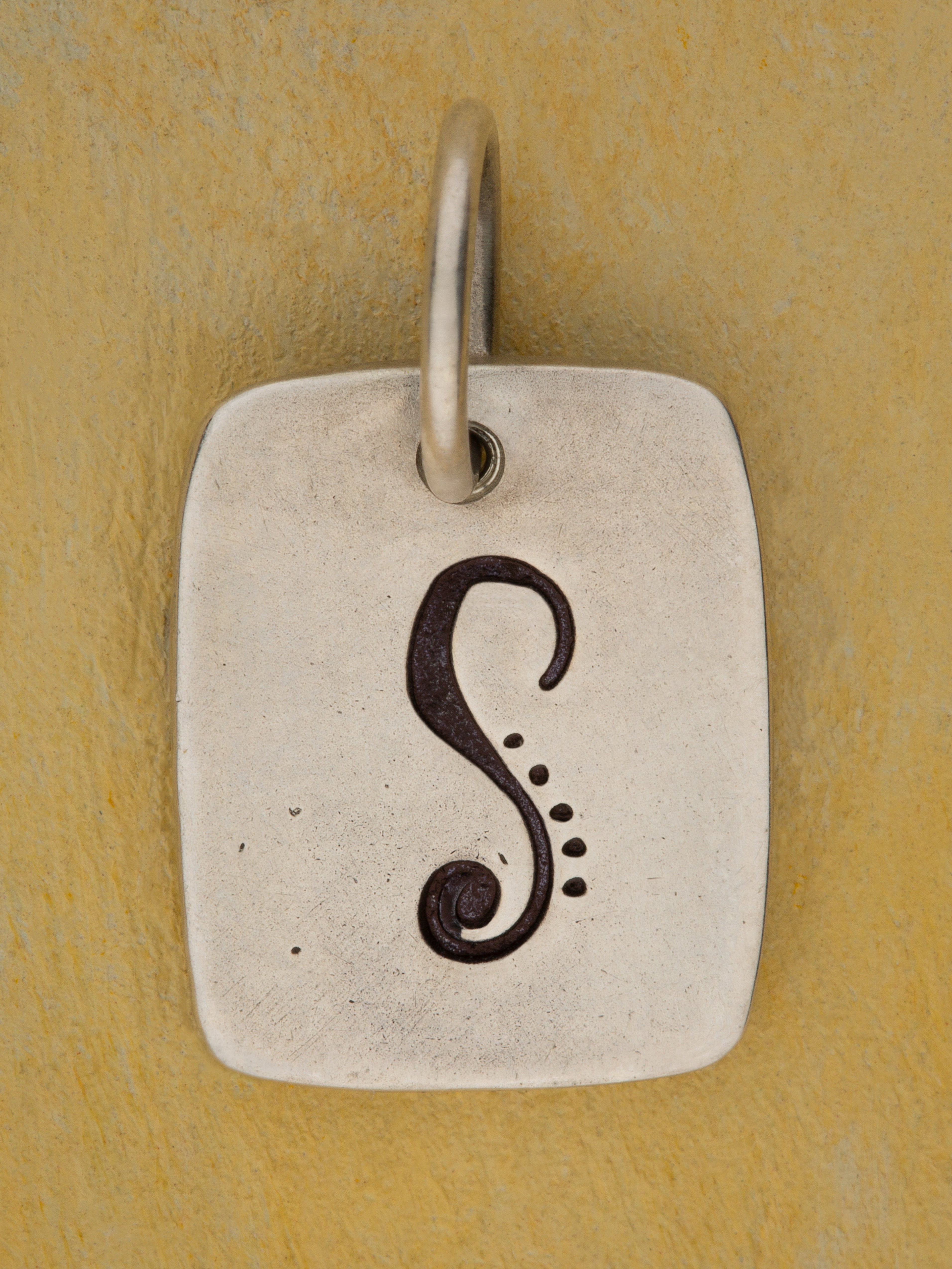 Stamped Initial Charm