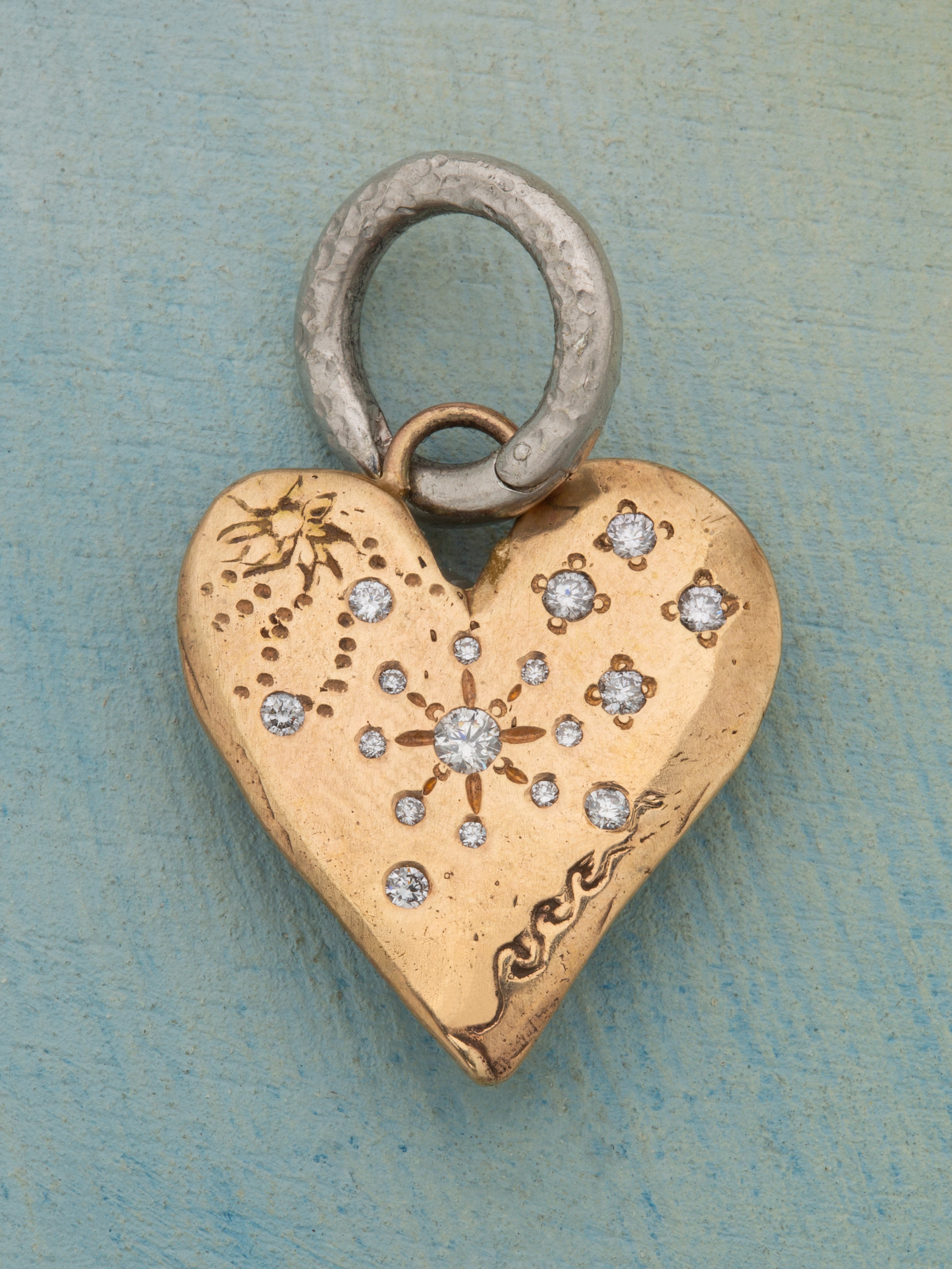 Heart Of Light Charm