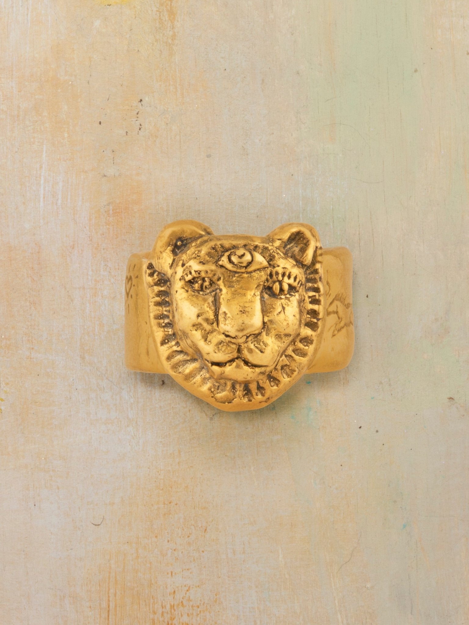 The Lioness in Gold Ring - Jes MaHarry